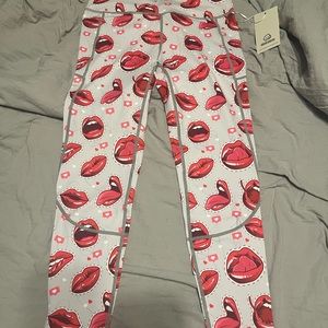 Brand new Feed Me Fight Me full length leggings